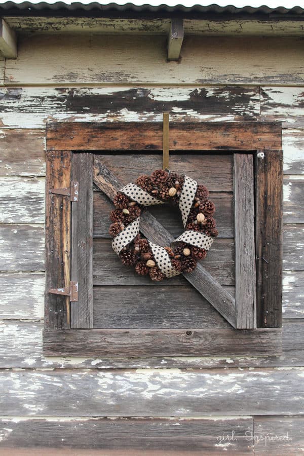 Rustic Pinecone Wreath hung outside