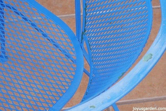 A detail of the patio set before painting