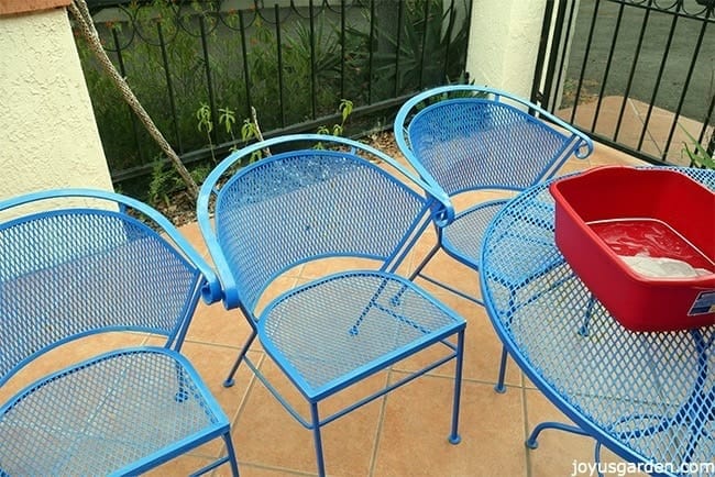 Cleaning the chairs after sanding