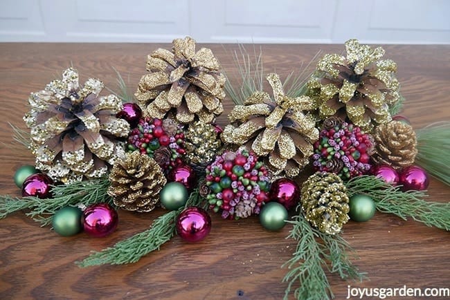 Love decorating with glitter! These pinecones are so easy to decorate and  really add a lot to your home dec…