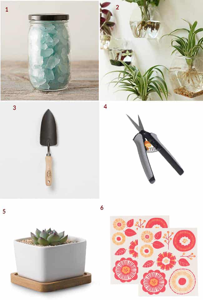 a collage with gifts for houseplants lovers which includes decorative glass chips, glass globes to hang on the wall, a trowel, floral nippers, a square white pot & small towels with flowers