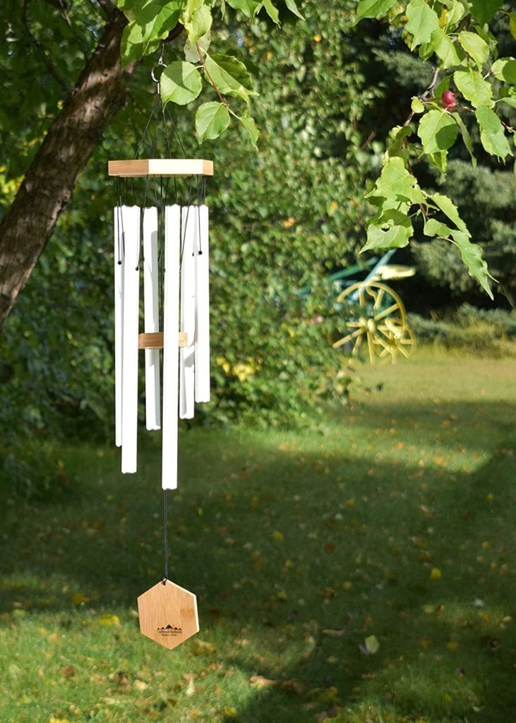  Wind chimes hanging from a tree.