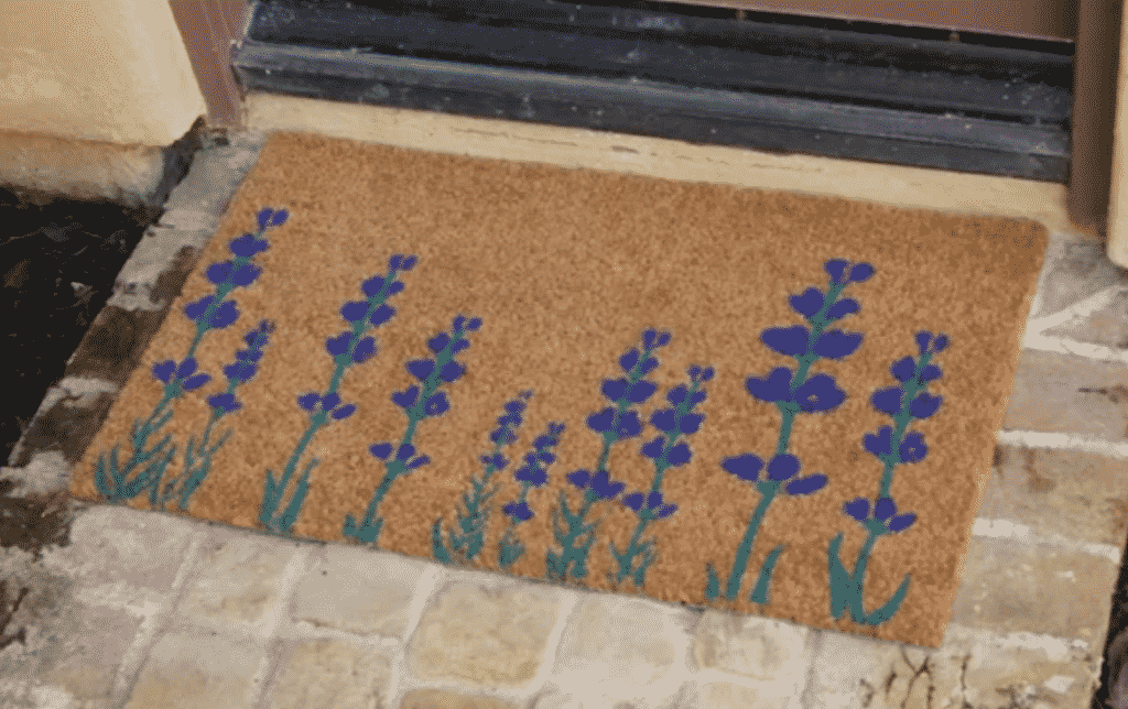 the burlington lavender flower doormat from wayfair