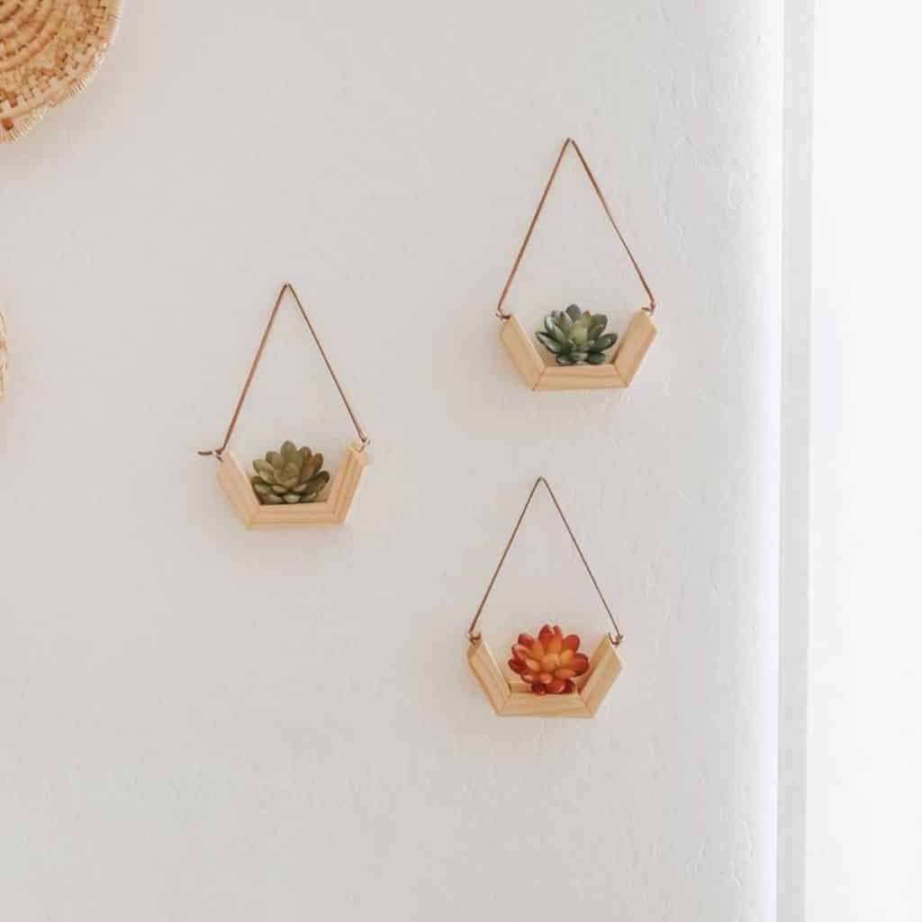 set of three wooden hanging planters from etsy