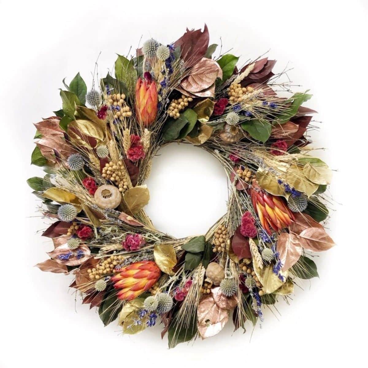 Wreath made of salal leaves, burgundy, copper, and natural basil from wayfair.