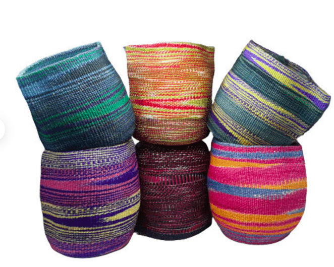 six multicolored woven plant baskets made from sustainable materials available to buy on etsy