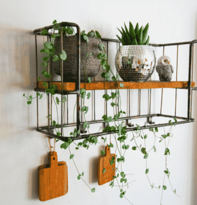 floating shelf with disco ball style planter from etsy