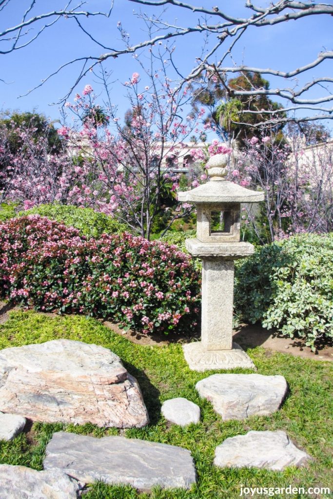a small stone pagoda at the japanese friendship garden in balboa park