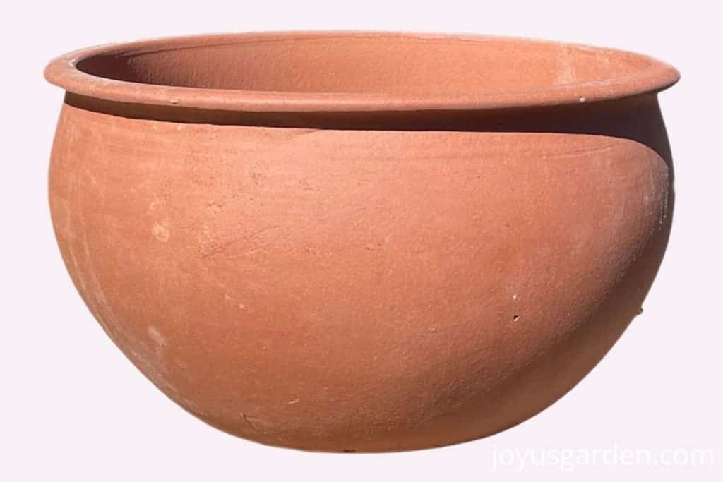 a round rim terracotta planter available to buy online at etsy