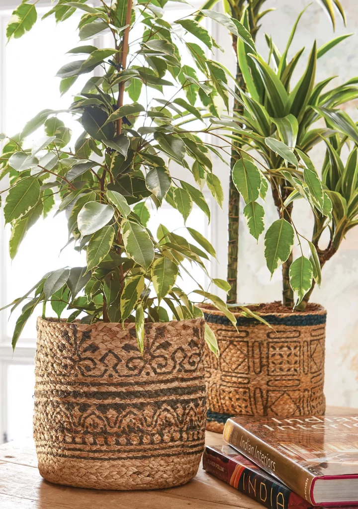 2 sustainable jute planters with 2 different block prints with plants in them to buy on etsy