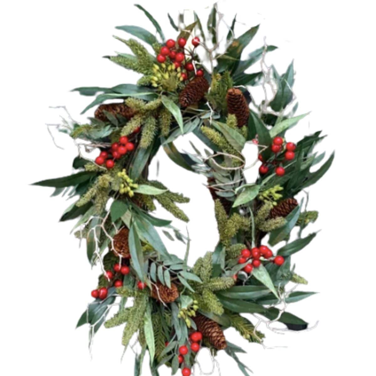 oval berry wreath with winter pine, bayleaf, twigs and berries from etsy