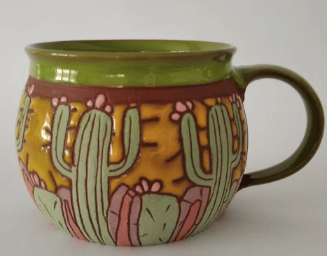 handmade cactus mug with cactus blooming and desert scene  from etsy