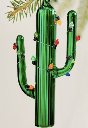  Blown Glass Cacti Ornament with little Christmas lights wrapped on it from west elm