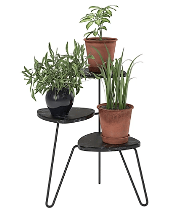 3 tier faux marble plant stand with a variety of plants shown from ashley furniture