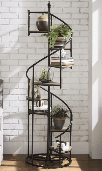 spiral staircase metal plant stand with a variety of plants shown from wayfair