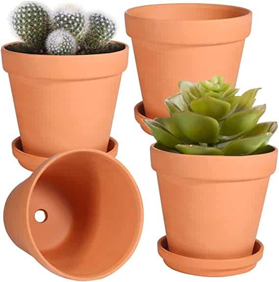 4 terracotta planters, 2 are shown with plants in them from amazon