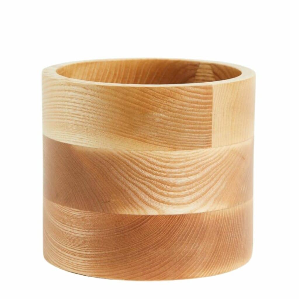 Wooden plant pot in light to medium tan from H&M.