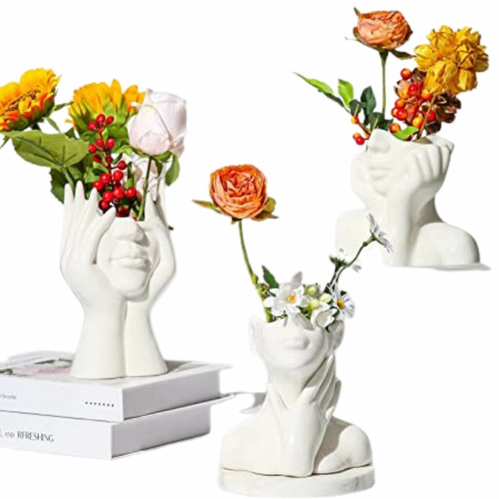 3 white Ceramic Head Planter Vases from Amazon.