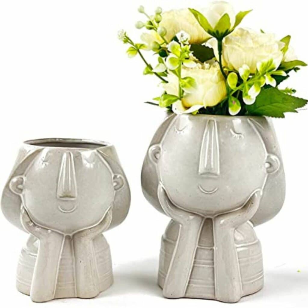 Set of 2 white Ceramic Face Pots from Amazon.