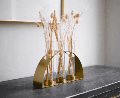 Brass & Glass Vase Set with dried flowers from Walmart.