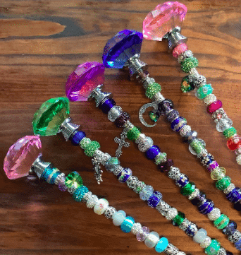 Colorful beaded fairy garden stakes from etsy.