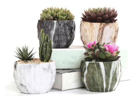 Four marble ceramic pots from Walmart.